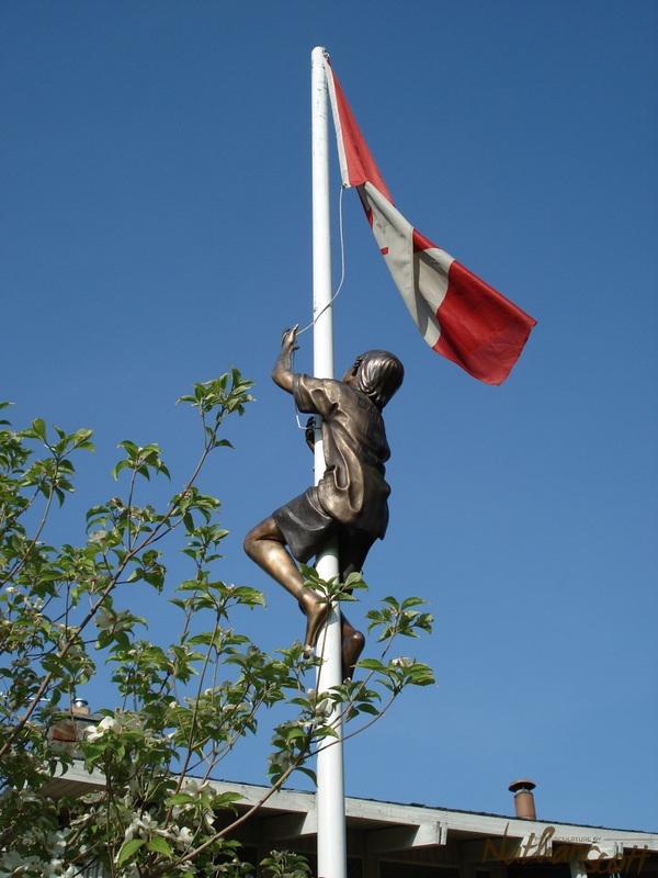 boy climbing flag pole bronze private commission nathan scott
