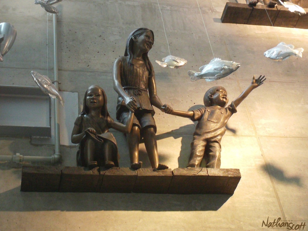 puiblic commission ymca vancouver bc nathan scott wonder 7 children chrome fish nathan scott sculptor