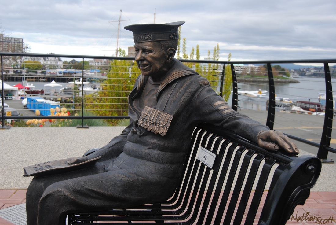 memorial park bronze statue bench victoria bc sculpture public commission homecoming nathan scott sculptor