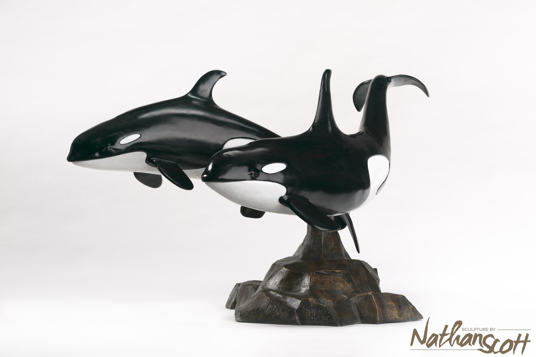 orca swimming sculpture art piece works
