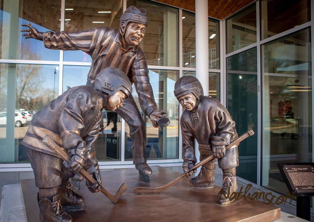 bronze sculpture hocket nathan scott tim bitsServus Arena in Red Deer Alberta