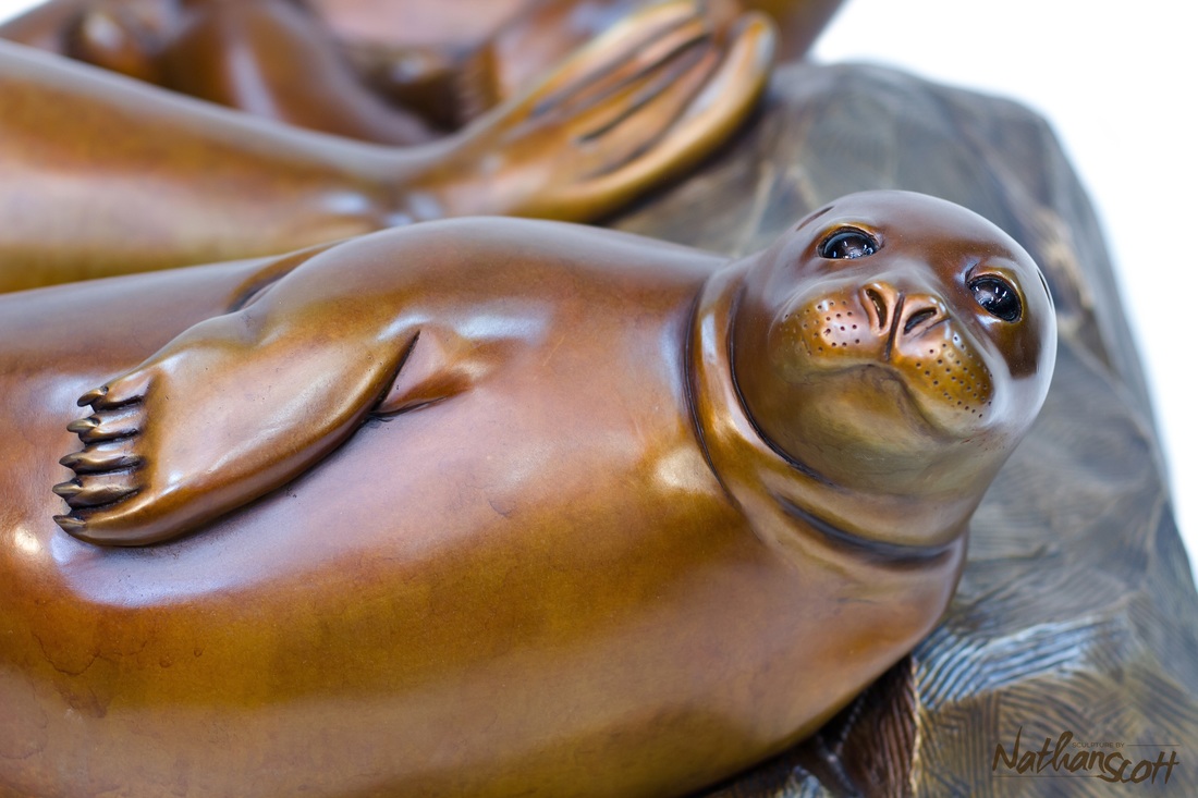 westcoast seal art table nathan scott bronze sculpture